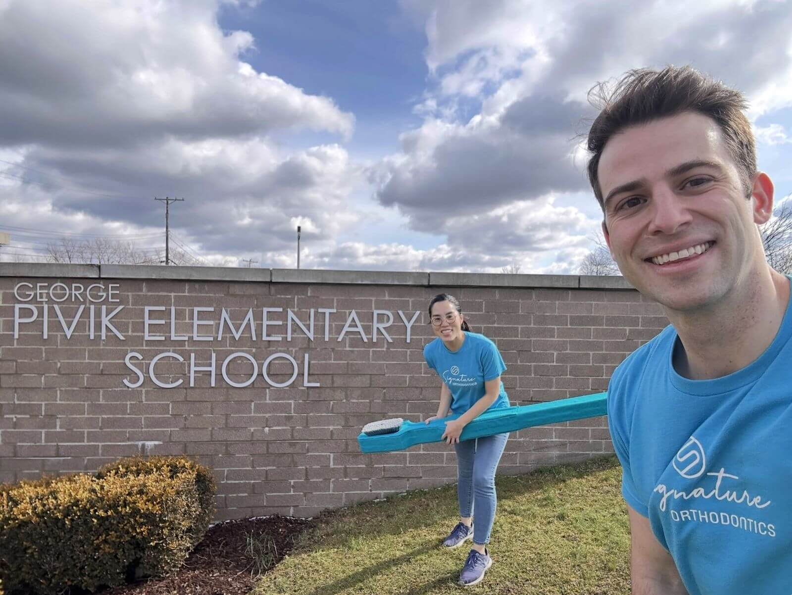 Signature Orthodontics team members visiting George Pivik Elementary School